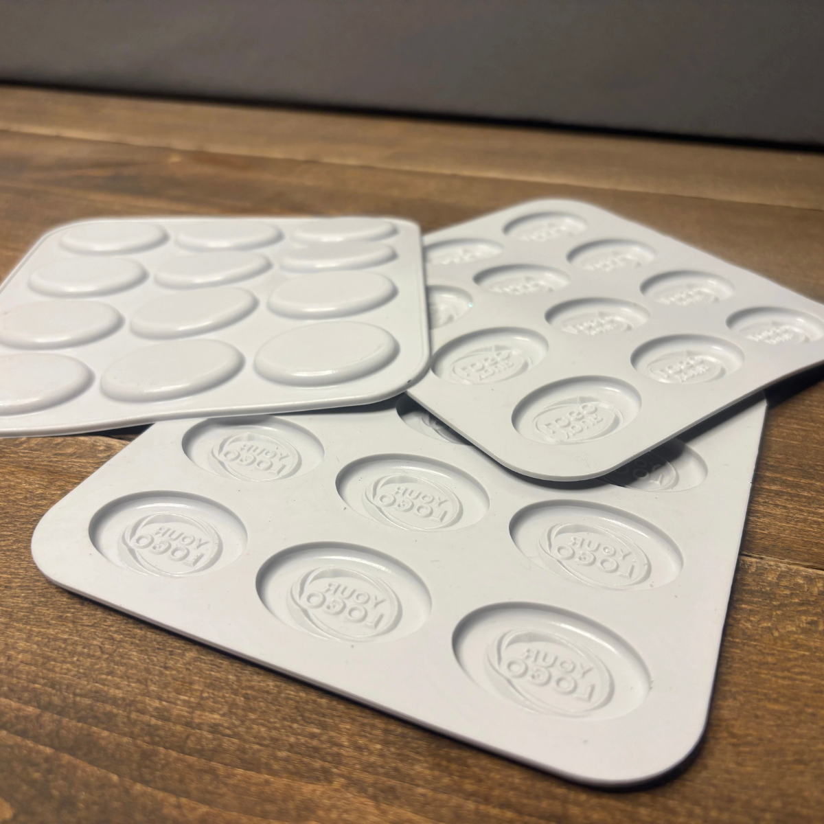 Back view of custom oval silicone mold trays for food-grade production