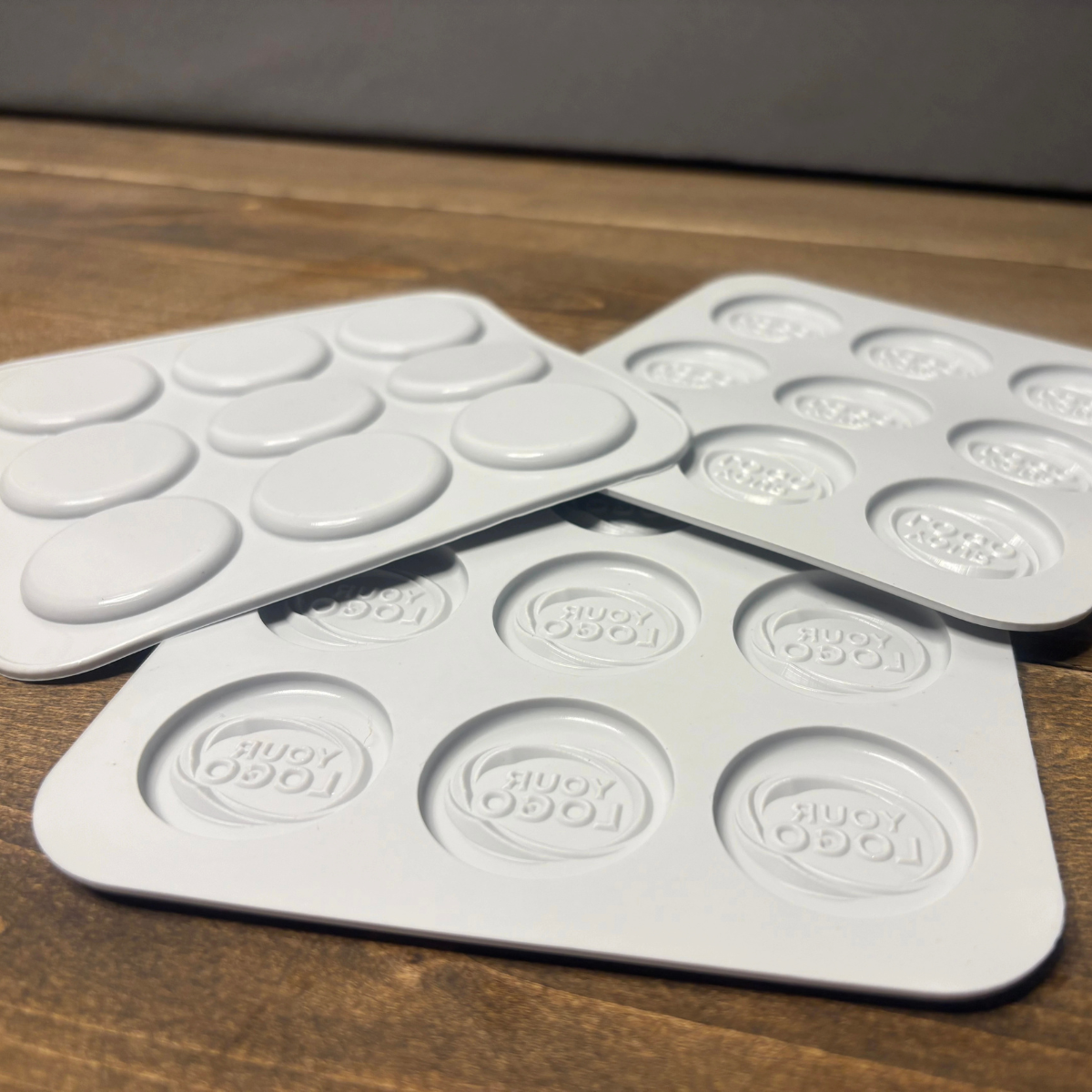 Custom oval silicone mold trays photographed from another angle