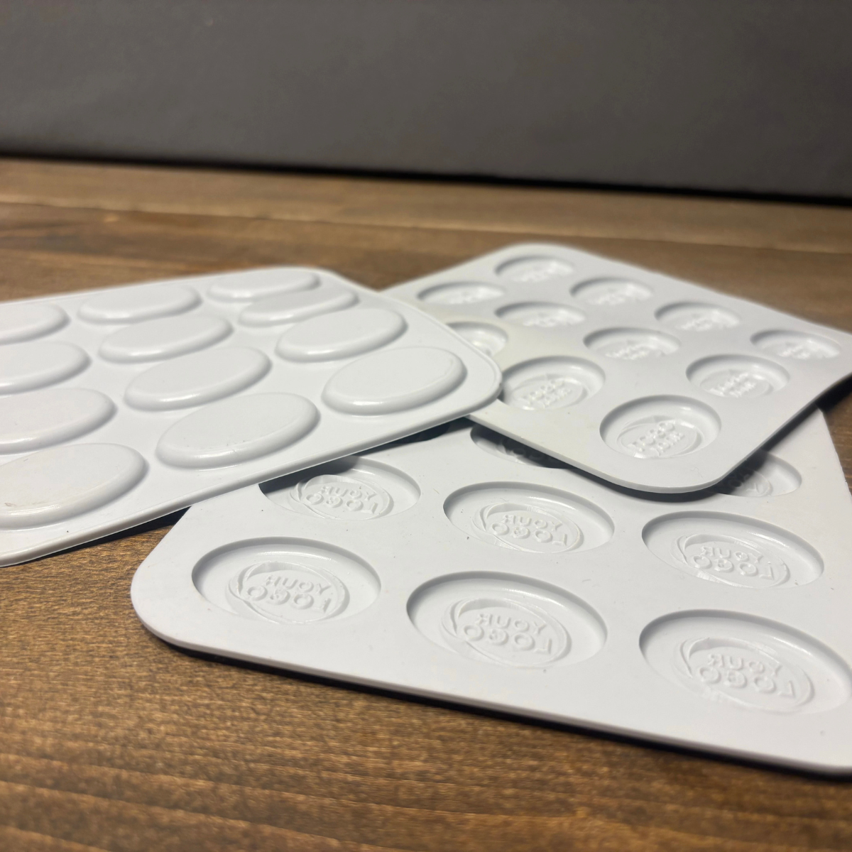 Custom oval silicone mold trays for chocolate production