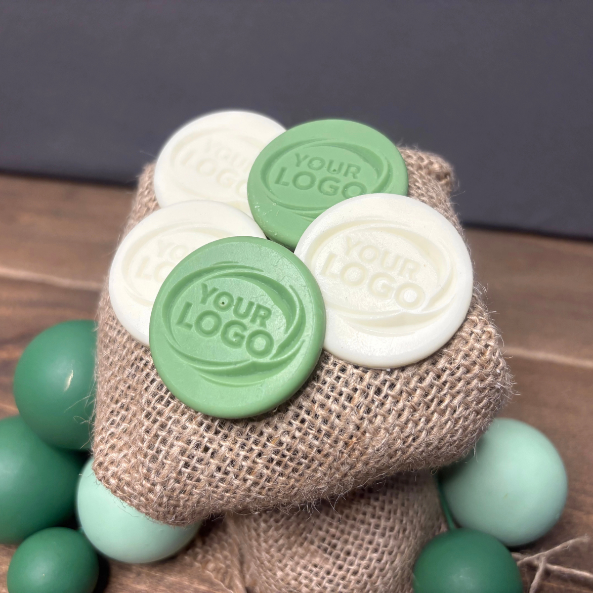 Close-up of round branded chocolates with custom logo